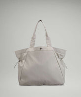 lululemon Multi Pocket Athletica Side-Cinch Tote Bag 19L - Creamy Clay