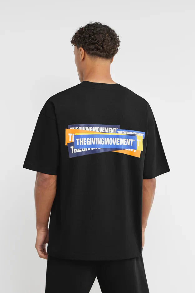 Unisex - Oversized Sticker Print T-Shirt - C Grade