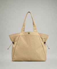 lululemon Multi Pocket Athletica Side-Cinch Tote Bag 19L - Creamy Clay